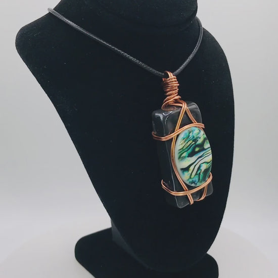 NOTE: Pendant displayed on a 5 inch tall bust.